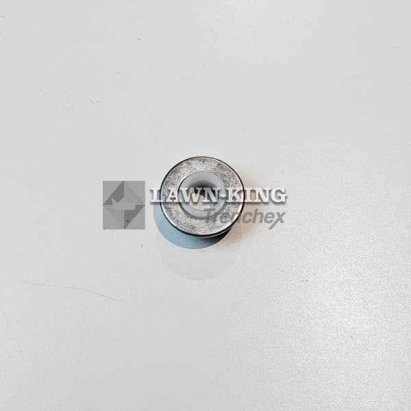 Zoomed out image of the underside of the Stiga Group (Mountfield, Alpina etc) tractor and metal bearing, silver with a circular fitting in the centre, against a white background.